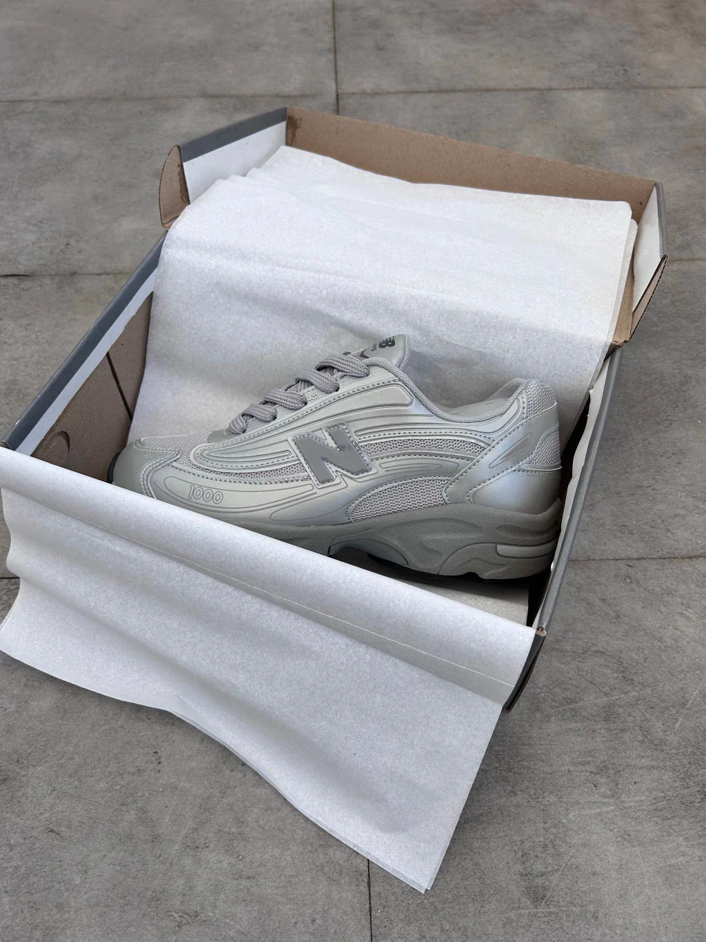 New Balance 1000 - Prata Refletivo